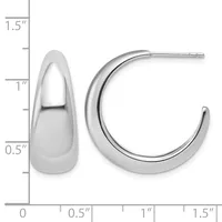 Polished silver-toned chunky curved hoop earrings displayed next to a measurement scale showing approximately one inch in height and width.