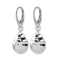 A pair of silver teardrop earrings with polished surfaces hanging from hinged lever-back closures.