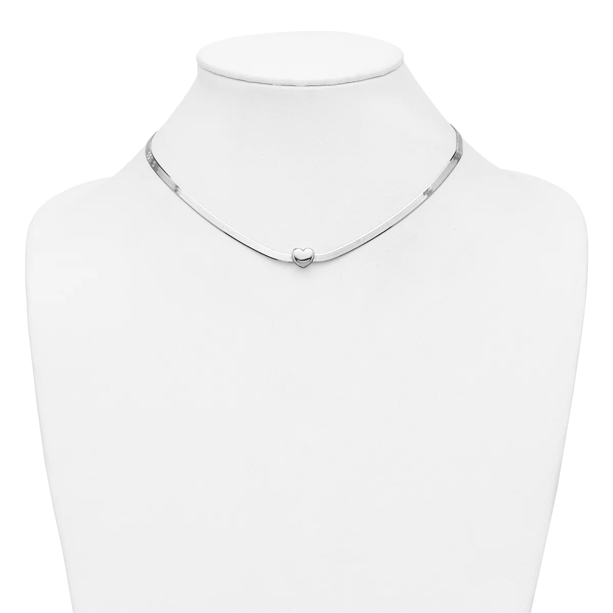 A delicate silver choker necklace with a small round pendant displayed on a white mannequin bust.