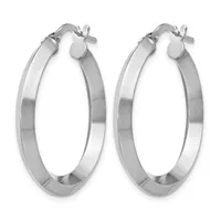 A pair of polished silver-toned oval hoop earrings with flat bands and hinged closures, shown from the front against a white background.