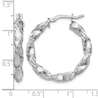 Pair of silver twisted hoop earrings with textured surface and curved posts, shown at actual size with measurement scale indicating approximately one inch in diameter.