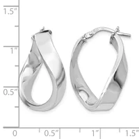 A pair of polished silver twisted hoop earrings with post and clutch closures, displayed against a measurement scale showing approximately one inch in height.