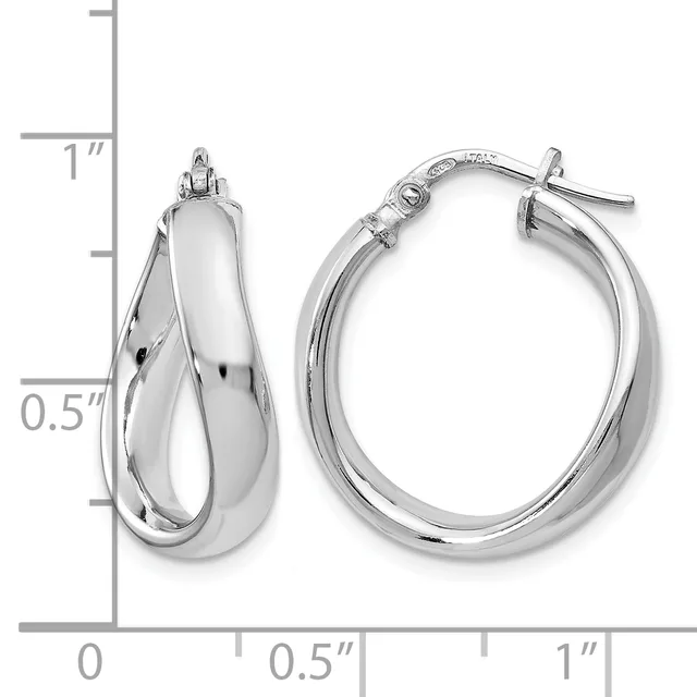 A pair of polished silver-toned hoop earrings with a twisted design, shown next to a ruler indicating they measure approximately one inch in length.