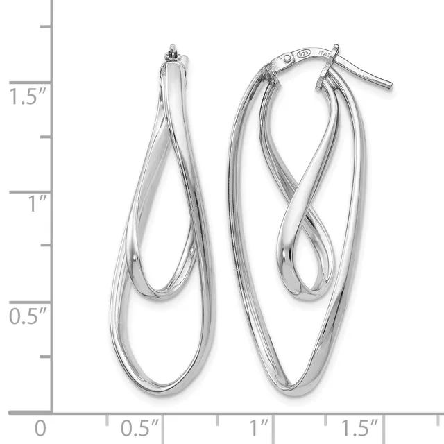 A pair of silver double-loop twist hoop earrings displayed against a measurement scale showing approximately 1.5 inches in length.