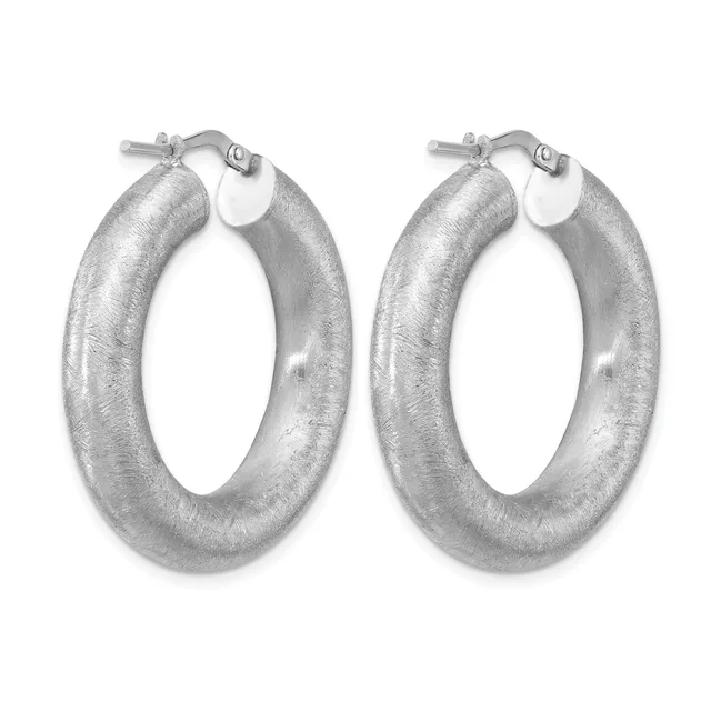 A pair of silver hoop earrings with a brushed textured finish and hinged post closures, displayed against a white background.