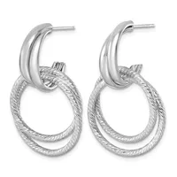 Pair of silver drop earrings with polished curved posts and textured oval loops hanging below.
