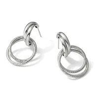 A pair of silver-toned double hoop earrings with textured outer rings and polished inner hoops, displayed against a white background.