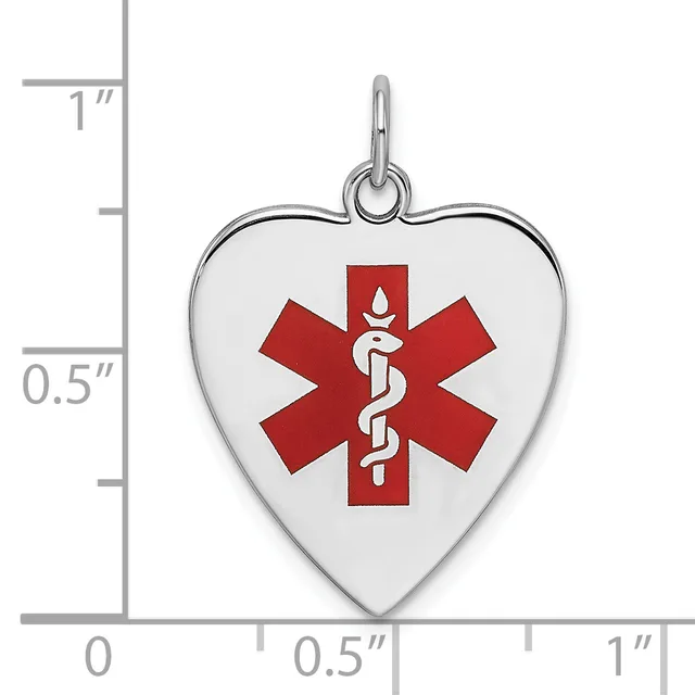 Silver heart-shaped medical alert pendant with red Star of Life symbol and attached bail, shown next to ruler measuring approximately one inch tall.