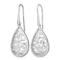A pair of silver teardrop earrings with ornate filigree cutout patterns throughout, hanging from long curved ear wires.