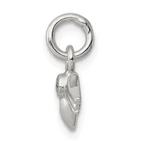 Silver shoe charm with detailed sculpting hanging from a split ring, shown against a white background.