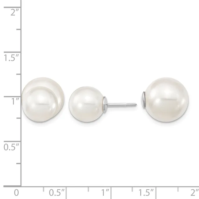 Three white pearl stud earrings displayed on a ruler showing sizes ranging from approximately one inch to two inches in diameter.