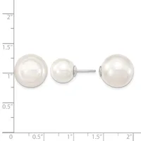 Two white pearl stud earrings shown next to each other on a measurement scale, displaying their spherical shape and lustrous surface.