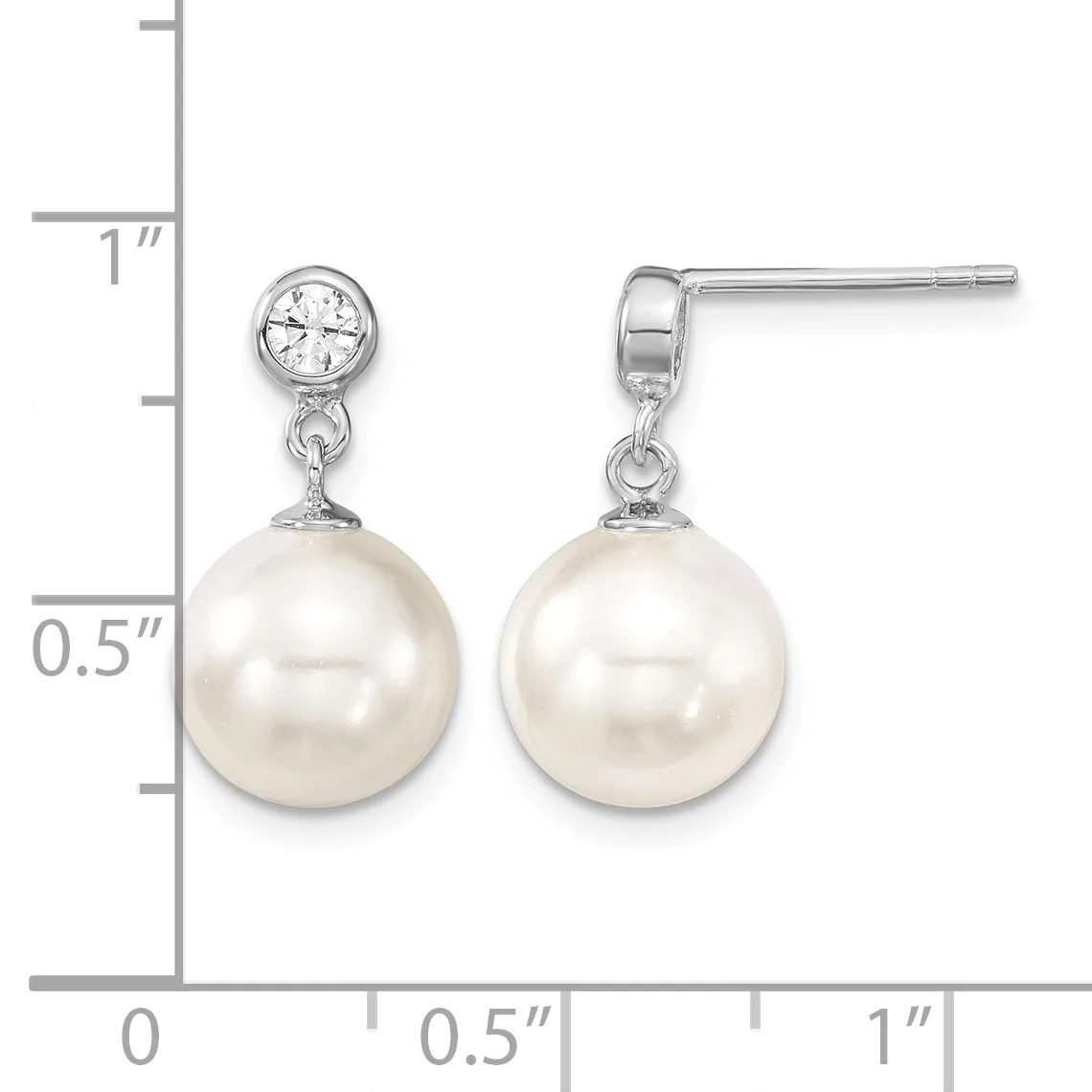 A pair of silver drop earrings with round white pearls suspended below round cubic zirconia stones, shown next to a measurement ruler.
