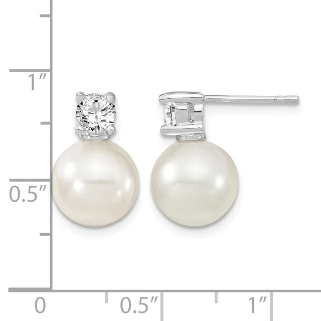 A pair of silver stud earrings with round white pearls suspended below round diamond-shaped crystal stones, displayed next to a measurement ruler.