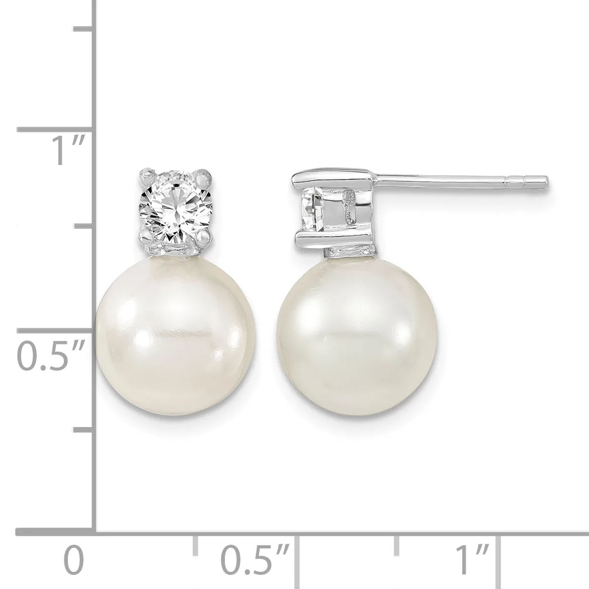 A pair of silver stud earrings with round white pearls suspended below round diamond-shaped crystal stones, displayed next to a measurement ruler.