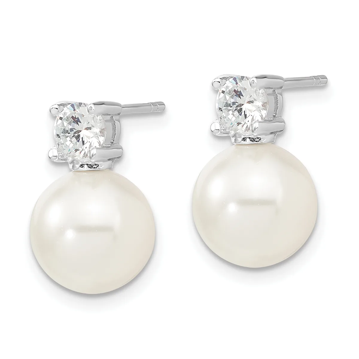 A pair of silver stud earrings featuring round white pearls suspended below cushion-cut diamond studs.