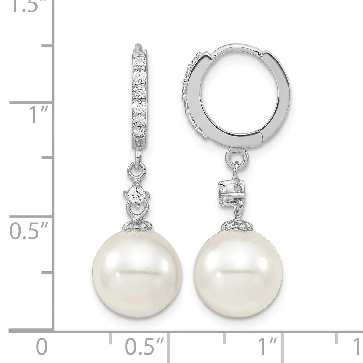 A pair of silver hoop earrings with diamond-accented posts and white pearl drops, displayed next to a measurement scale.