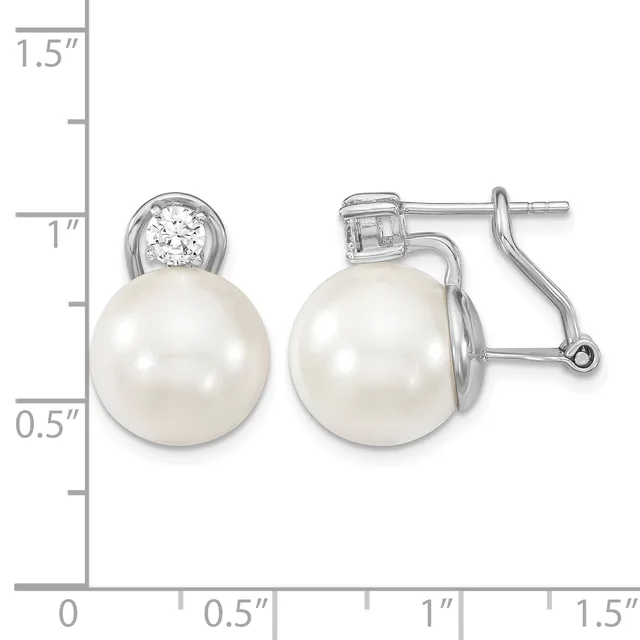 Pair of silver earrings with white pearl drops and round diamond studs, displayed next to a measurement ruler showing approximately one inch in length.