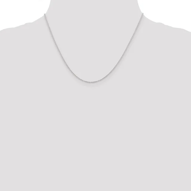 A delicate silver chain necklace displayed on a mannequin torso against a white background.