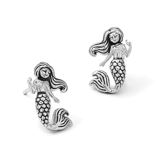 Pair of silver mermaid earrings with long flowing hair, detailed scaled tails, and small hallmarks, shown from front and side angles.