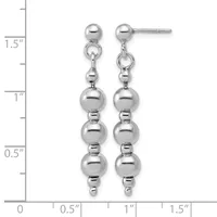 Pair of silver ball dangle earrings with graduated spheres suspended from small round studs, displayed against a measurement scale showing approximately 1.5 inches in length.