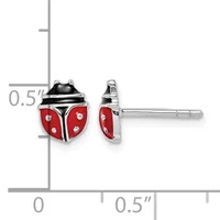 Pair of red and black enamel ladybug stud earrings with silver posts, shown front and side view with measurement scale indicating approximately half-inch size.