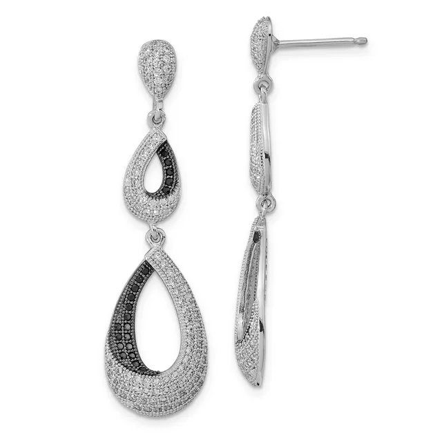 A pair of silver teardrop earrings with black and white gemstone pavé settings, shown from front and side views.