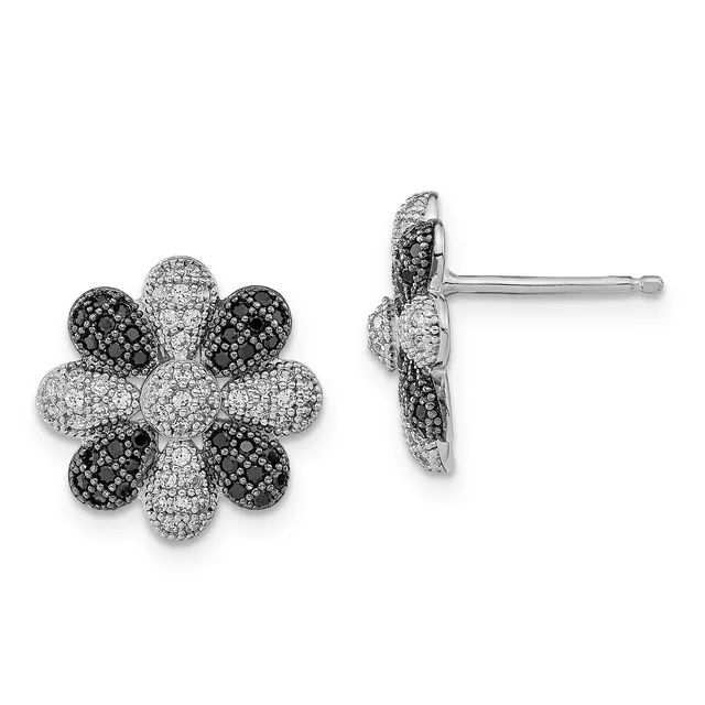 Pair of flower-shaped stud earrings with alternating black and white pavé-set crystals in a six-petal design, shown from front and side views.