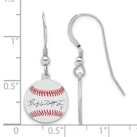 A pair of silver-toned baseball earrings with fish hook wires, featuring white enamel baseball charms with red stitching and a handwritten signature, shown against a measurement scale.