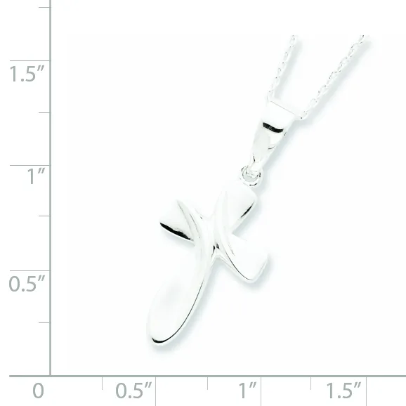 White metal cross pendant with black enamel accents on a beaded chain, shown next to a ruler measuring approximately 1.5 inches in length.