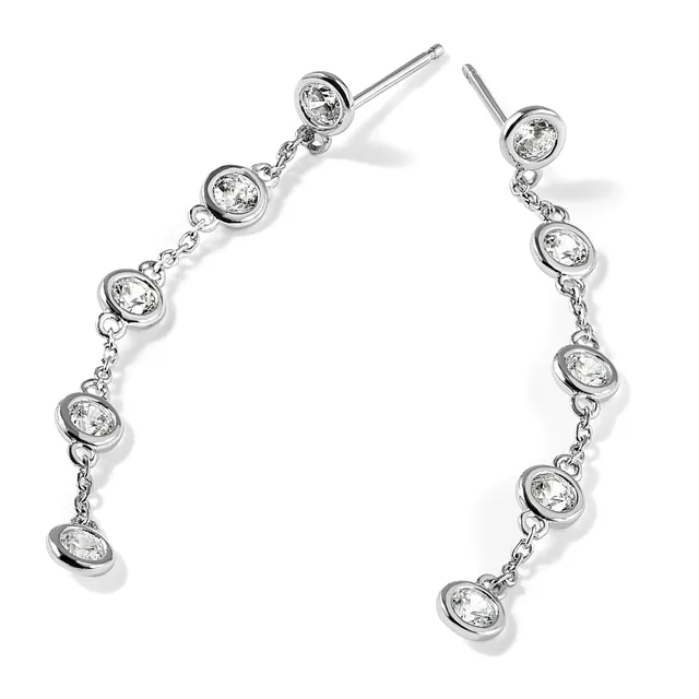 Pair of silver drop earrings with bezel-set round diamonds connected by delicate chains, displayed against a white background.