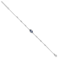 Silver chain bracelet with small round diamond spacers and a blue sapphire evil eye charm in the center, featuring lobster claw clasps at both ends.