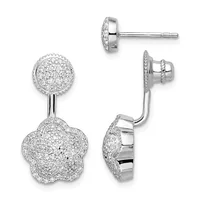 Pair of silver drop earrings with circular pave diamond studs connected to larger flower-shaped pave diamond pendants, shown from front and side angles.