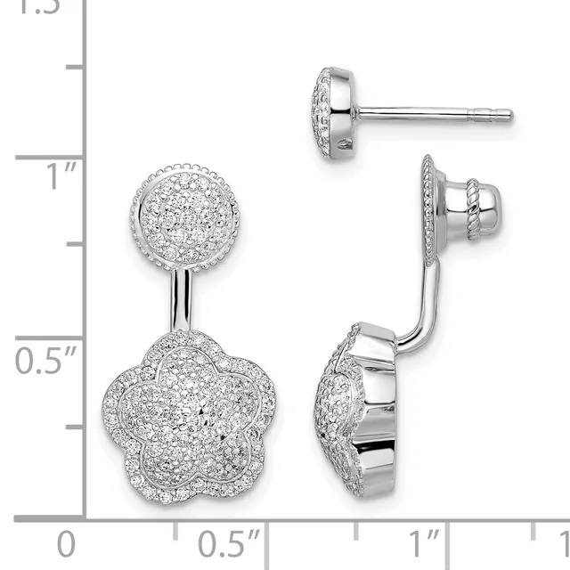 Silver earrings with circular diamond-paved studs connected to four-petaled flower-shaped diamond-paved drops, shown from front and side views against a measurement scale.