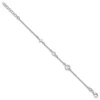 Silver-toned chain bracelet with small charm pendants including a cross and heart, displayed diagonally against a white background.