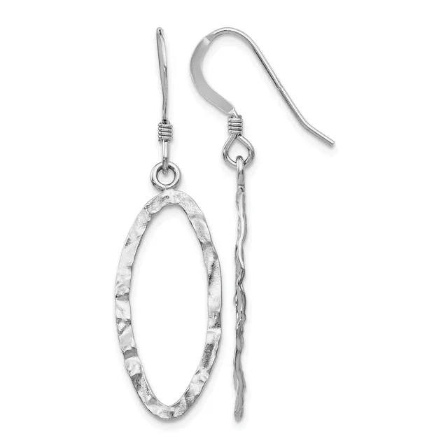 A pair of silver drop earrings with hammered oval pendants hanging from curved ear wires with decorative wrapping.