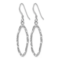 Pair of silver fish hook earrings with textured oval pendants hanging from wire hooks.
