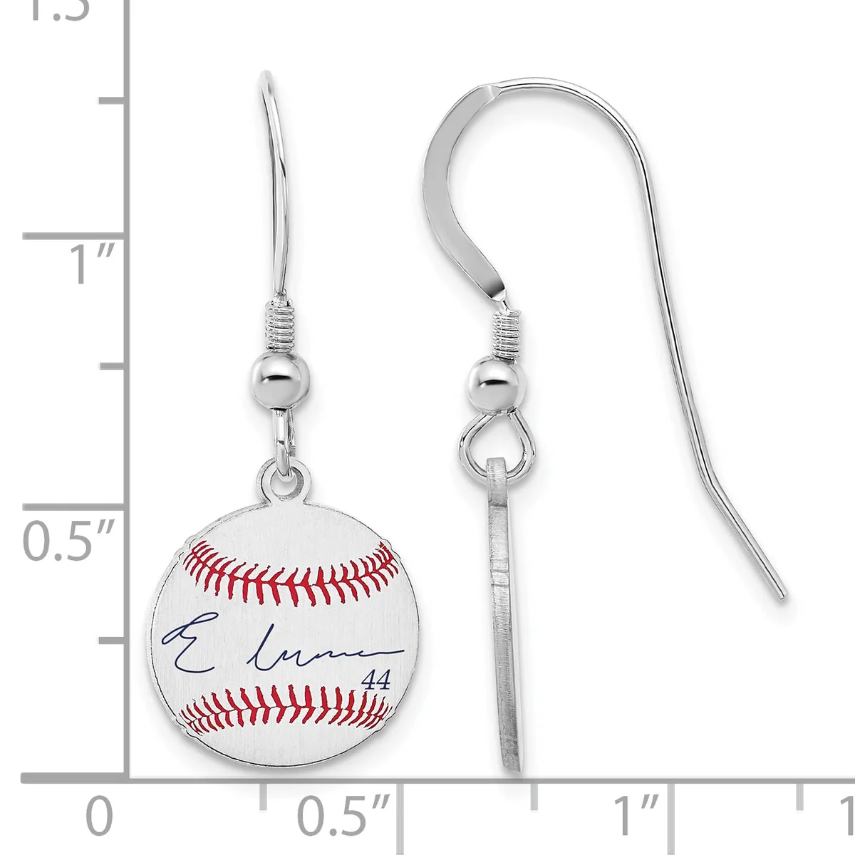 Pair of silver-toned earrings with fish hook wires featuring miniature baseball pendants with red stitching and blue signature, shown next to a measurement ruler.