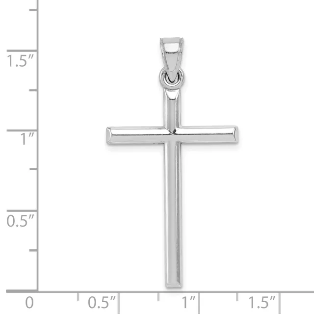 A polished silver cross pendant shown against a measurement scale indicating it is approximately one inch wide and one and a half inches tall.