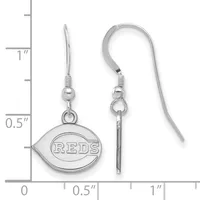 A pair of silver-colored fish-shaped earrings with a small stamped hallmark, shown on wires with measurement scale indicating approximately one inch in length.
