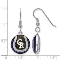 Pair of dangling earrings featuring round pendants with dark blue stone, silver-tone metal bands, and black enamel center with a small stamped hallmark, shown front and side view against a measurement scale.