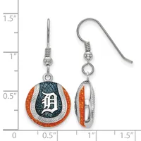 A pair of silver-colored earrings with orange and dark blue enamel in a rounded shield shape, shown front and back against a measurement scale.