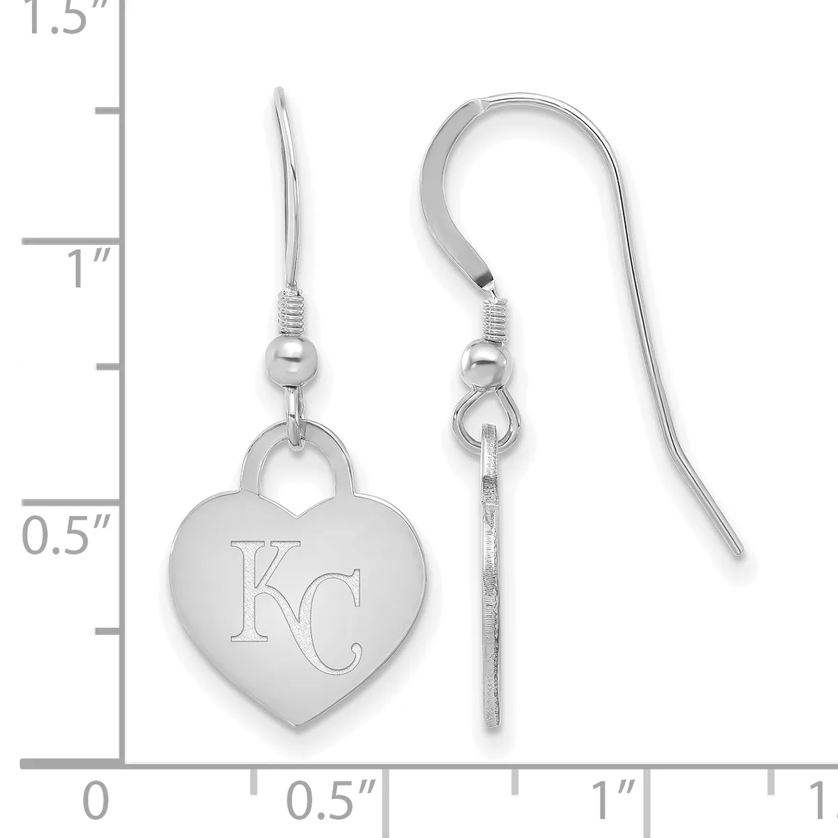 A pair of silver heart-shaped dangle earrings with engraved initials, shown against a measurement scale indicating approximately one inch in length.