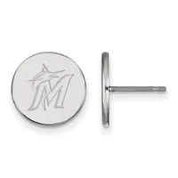 A pair of silver-toned circular earrings with post backs, each featuring an engraved stylized M logo, shown from front and side views.