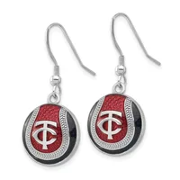 A pair of silver fish hook earrings with round pendant charms featuring red enamel centers, white crossed symbols, and decorative silver borders on black backgrounds.