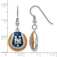 Pair of dangling earrings with silver fishhook backs featuring round charms with blue crystal centers, white "NY" letters, and orange enamel outer rings, shown next to a measurement scale.
