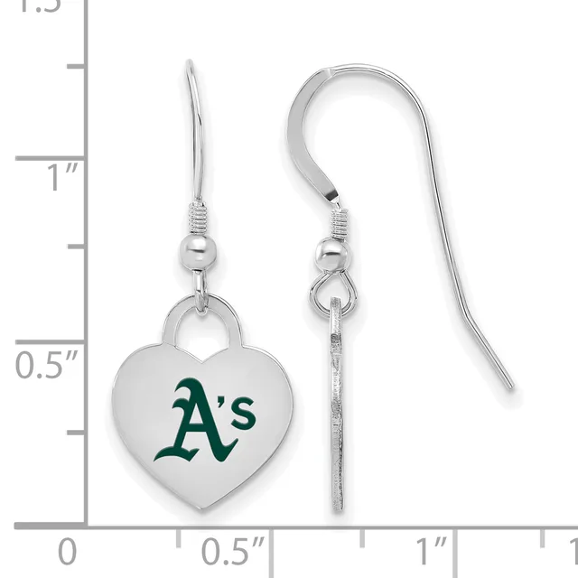 A pair of silver heart-shaped earrings with green A's logo, displayed next to a measurement ruler showing approximately 1.5 inches in length.