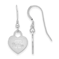 A pair of silver-toned heart-shaped dangle earrings with engraved sports team logo, shown from front and side views.