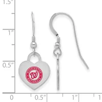Pair of silver-toned heart-shaped dangle earrings with a red circular logo, shown next to a ruler for scale.