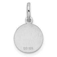 A round silver pendant with a brushed finish and small stamped hallmark on the back, suspended from a polished silver bail.